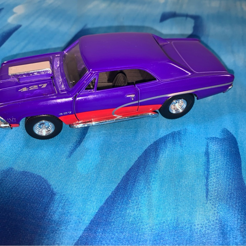 Chevy Malibu 1966 Vibrant Purple and Red Toy Car